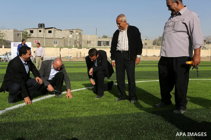 Alexander Gross, the development of FIFA's program in Asia director attends the inauguration ceremony of play field in Gaza city, on Nov. 23, 2016. Photo by Mohammed Asad