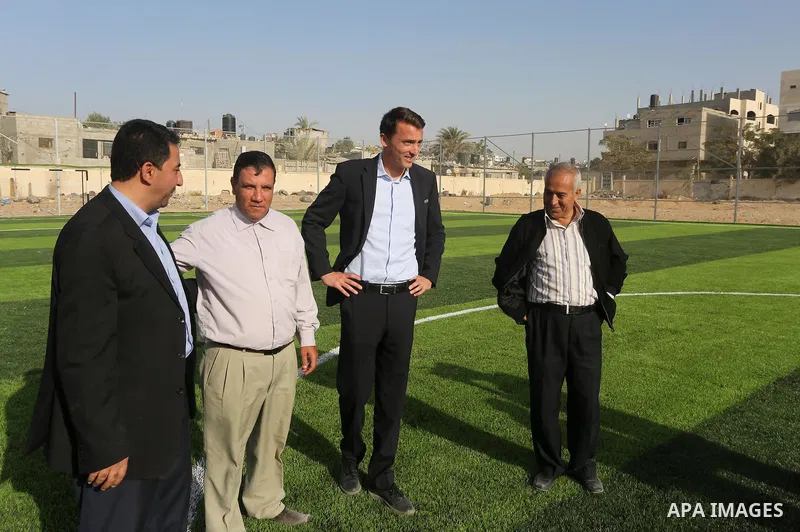 Alexander Gross, the development of FIFA's program in Asia director attends the inauguration ceremony of play field in Gaza city, on Nov. 23, 2016. Photo by Mohammed Asad