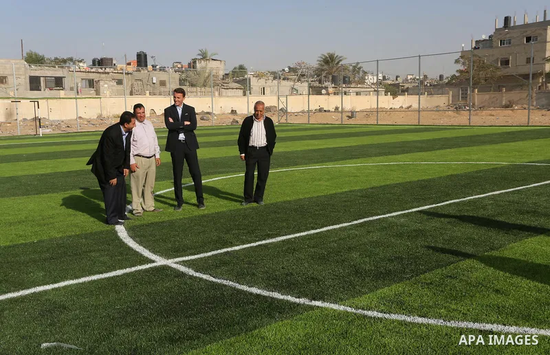Alexander Gross, the development of FIFA's program in Asia director attends the inauguration ceremony of play field in Gaza city, on Nov. 23, 2016. Photo by Mohammed Asad