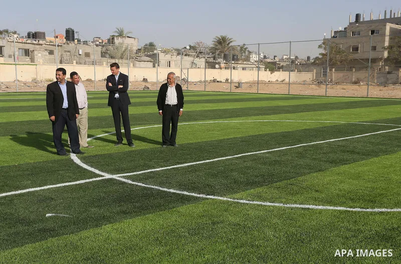 Alexander Gross, the development of FIFA's program in Asia director attends the inauguration ceremony of play field in Gaza city, on Nov. 23, 2016. Photo by Mohammed Asad
