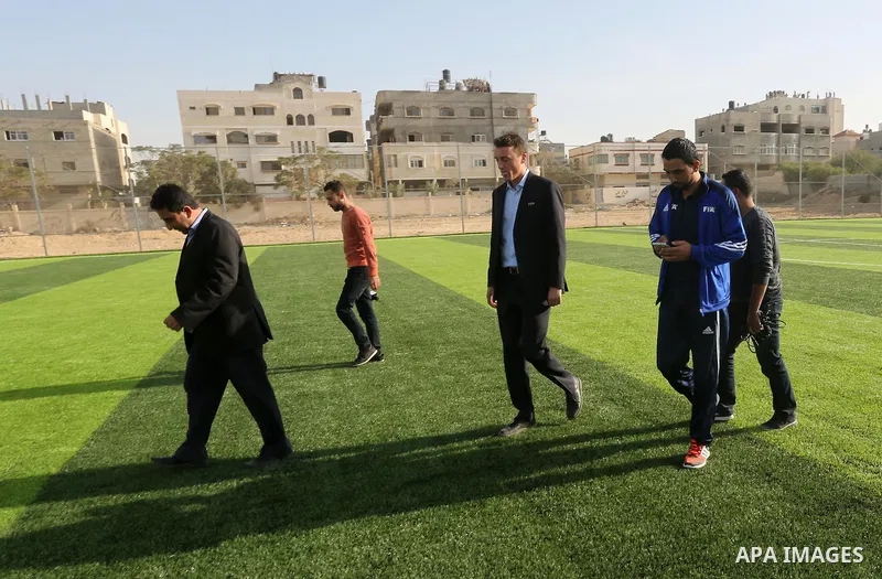 Alexander Gross, the development of FIFA's program in Asia director attends the inauguration ceremony of play field in Gaza city, on Nov. 23, 2016. Photo by Mohammed Asad