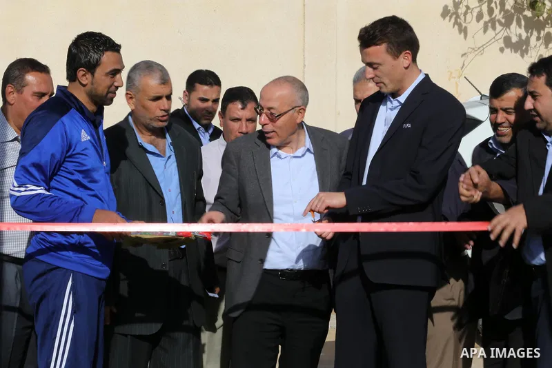 Alexander Gross, the development of FIFA's program in Asia director attends the inauguration ceremony of play field in Gaza city, on Nov. 23, 2016. Photo by Mohammed Asad