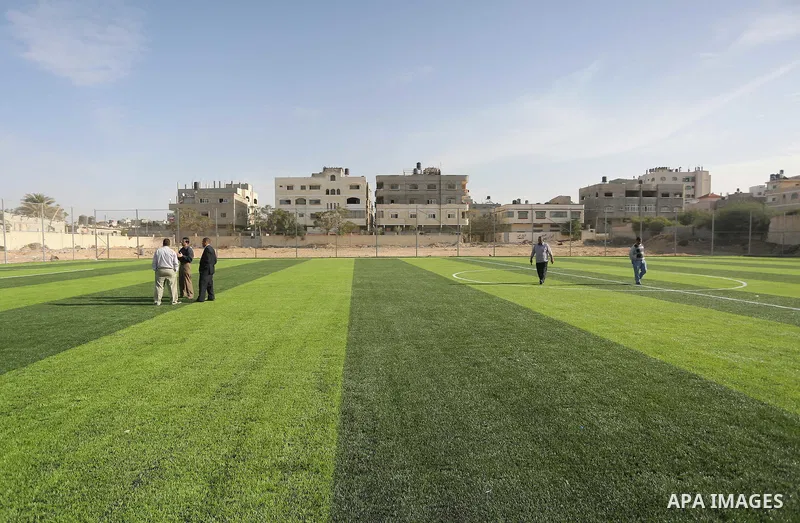 Alexander Gross, the development of FIFA's program in Asia director attends the inauguration ceremony of play field in Gaza city, on Nov. 23, 2016. Photo by Mohammed Asad
