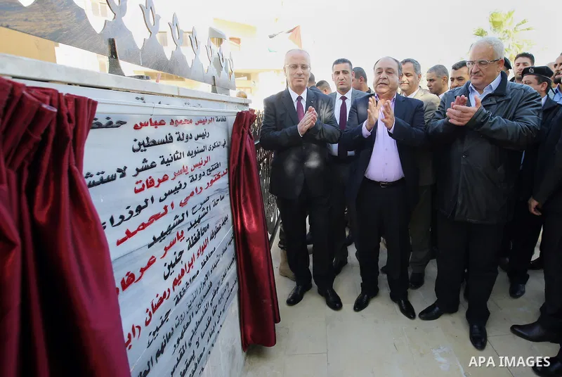 Palestinian Prime Minister Rami Hamdallah attends a ceremony of laying the foundation stone of the Jenin power plant, in the West Bank city of Jenin, on Nov. 24, 2016. Photo by Prime Minister Office
