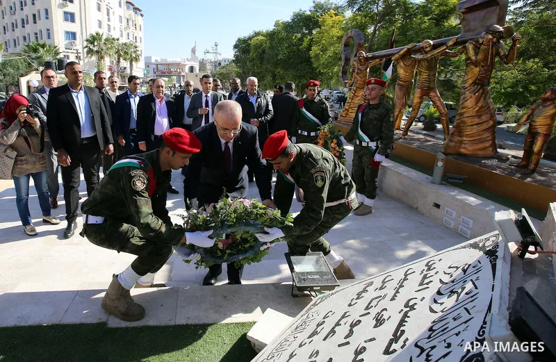 Palestinian Prime Minister Rami Hamdallah attends a ceremony of laying the foundation stone of the Jenin power plant, in the West Bank city of Jenin, on Nov. 24, 2016. Photo by Prime Minister Office