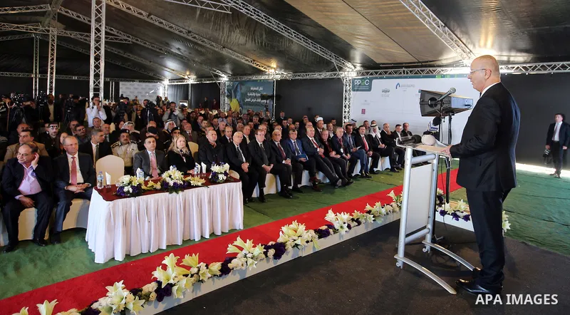 Palestinian Prime Minister Rami Hamdallah speaks during a ceremony of laying the foundation stone of the Jenin power plant, in the West Bank city of Jenin, on Nov. 24, 2016. Photo by Prime Minister Office