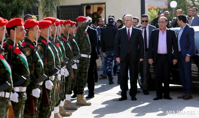 Palestinian Prime Minister Rami Hamdallah attends a ceremony of laying the foundation stone of the Jenin power plant, in the West Bank city of Jenin, on Nov. 24, 2016. Photo by Prime Minister Office