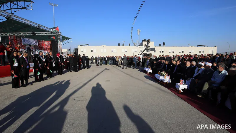Palestinian Prime Minister Rami Hamdallah attends a mass wedding ceremony supported by Palestinian President Mahmoud Abbas, in the West Bank city of Jenin on Nov. 24, 2016. Photo by Prime Minister Office