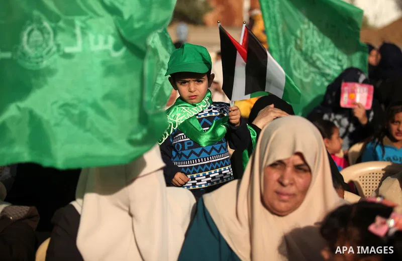 Palestinian women supporter Hamas movement take part in a rally in Gaza city on November 25, 2016. Photo by Ashraf Amra