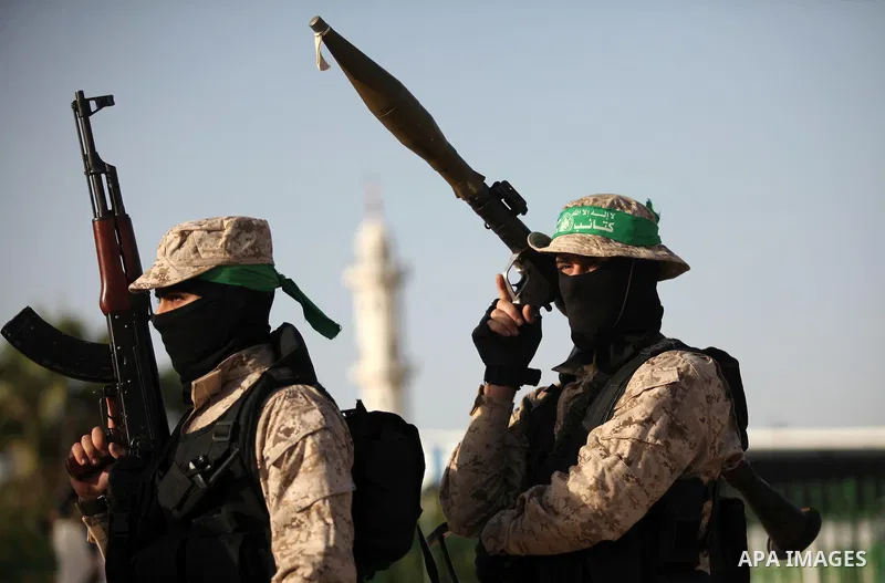 Palestinian militants of the Hamas movement take part in a rally in Gaza city on November 25, 2016. Photo by Ashraf Amra