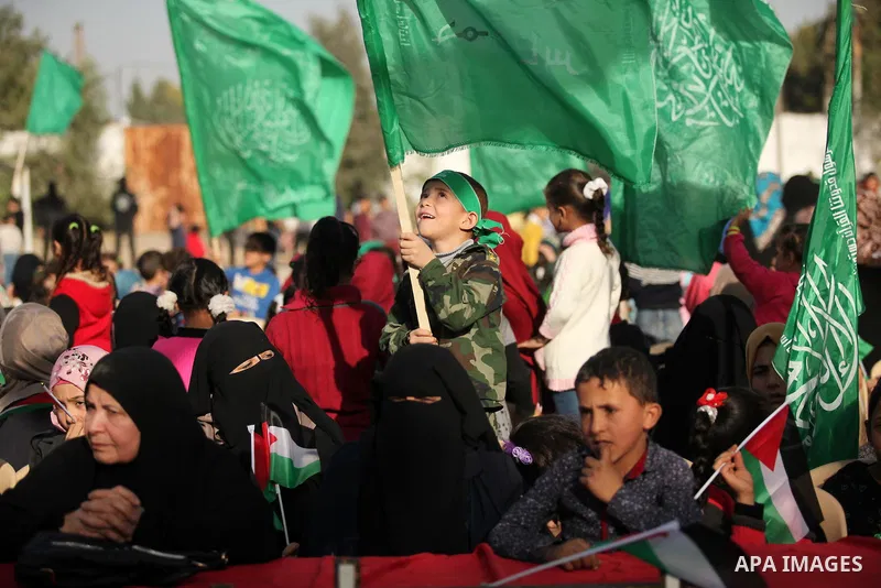 Palestinian women supporter Hamas movement take part in a rally in Gaza city on November 25, 2016. Photo by Ashraf Amra