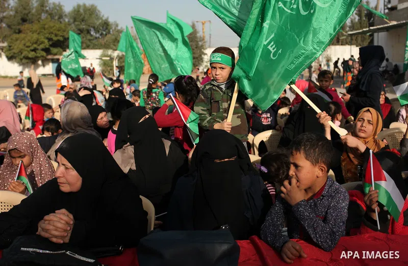 Palestinian women supporter Hamas movement take part in a rally in Gaza city on November 25, 2016. Photo by Ashraf Amra