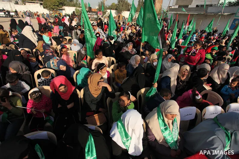 Palestinian women supporter Hamas movement take part in a rally in Gaza city on November 25, 2016. Photo by Ashraf Amra