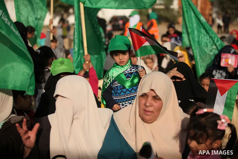 Palestinian women supporter Hamas movement take part in a rally in Gaza city on November 25, 2016. Photo by Ashraf Amra
