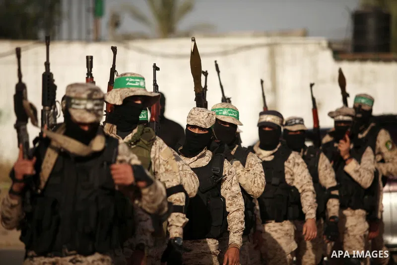 Palestinian militants of the Hamas movement take part in a rally in Gaza city on November 25, 2016. Photo by Ashraf Amra