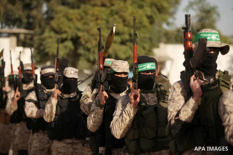 Palestinian militants of the Hamas movement take part in a rally in Gaza city on November 25, 2016. Photo by Ashraf Amra