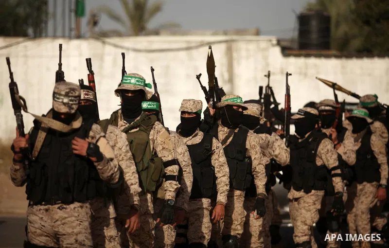Palestinian militants of the Hamas movement take part in a rally in Gaza city on November 25, 2016. Photo by Ashraf Amra