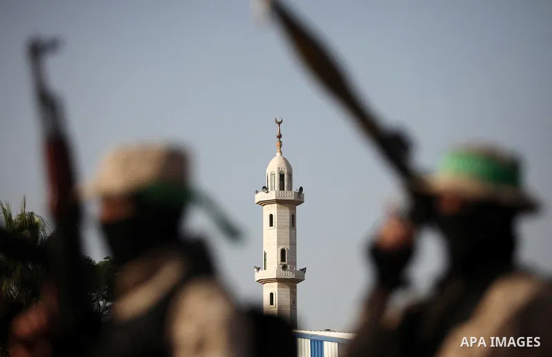 Palestinian militants of the Hamas movement take part in a rally in Gaza city on November 25, 2016. Photo by Ashraf Amra