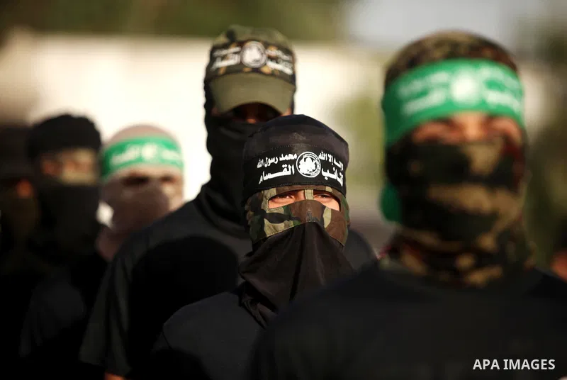 Palestinian militants of the Hamas movement take part in a rally in Gaza city on November 25, 2016. Photo by Ashraf Amra