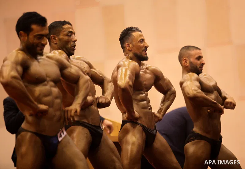 Palestinian participants pose during a bodybuilding competition in the West Bank city of Nablus November 25, 2016. Photo by Nedal Eshtayah
