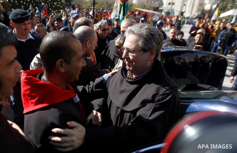 Custodian of the Holy Land Father Francesco Patton arrives to the church of Nativity to ceremonially launch the beginning of the Christmas season, in the West Bank city of Bethlehem November 26, 2016. Photo by Wisam Hash...
