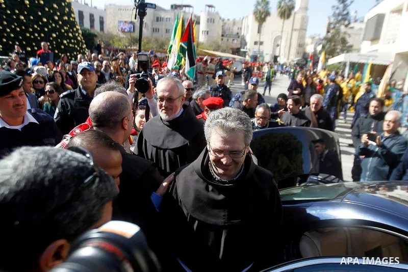 Custodian of the Holy Land Father Francesco Patton arrives to the church of Nativity to ceremonially launch the beginning of the Christmas season, in the West Bank city of Bethlehem November 26, 2016. Photo by Wisam Hash...