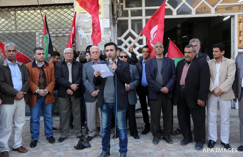 Palestinian supporters of Palestinian People's Party take part in a rally to solidarity with of Cuban historic revolutionary leader Fidel Castro after his death, in Gaza city 27, 2016. Cuban revolutionary icon Fidel Cast...
