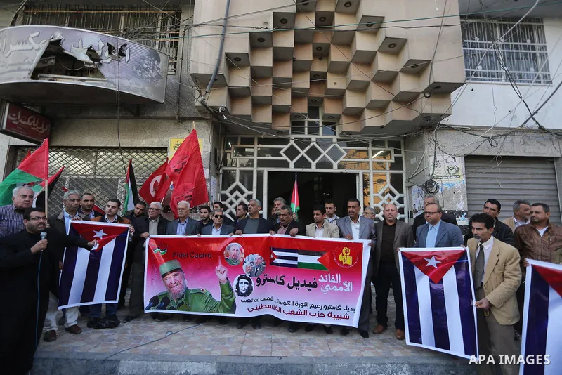 Palestinian supporters of Palestinian People's Party take part in a rally to solidarity with of Cuban historic revolutionary leader Fidel Castro after his death, in Gaza city 27, 2016. Cuban revolutionary icon Fidel Cast...