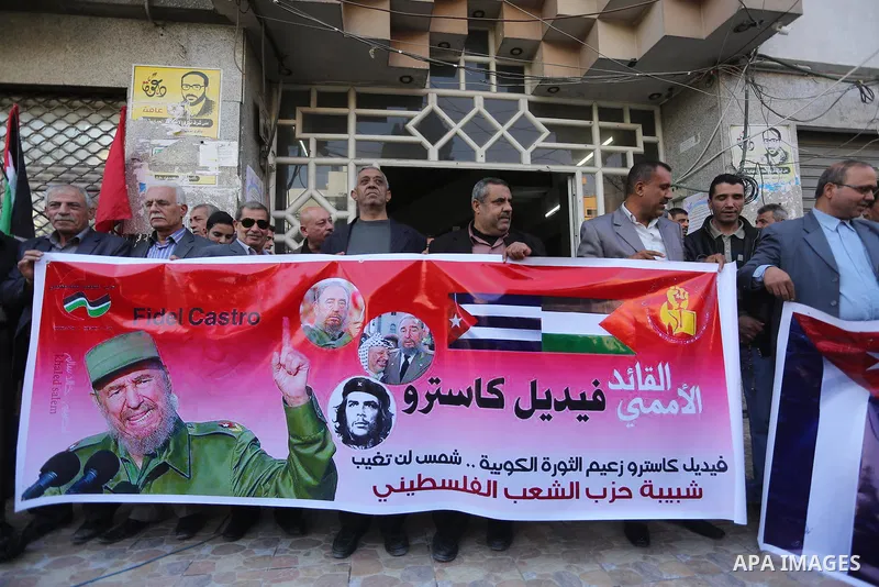 Palestinian supporters of Palestinian People's Party take part in a rally to solidarity with of Cuban historic revolutionary leader Fidel Castro after his death, in Gaza city 27, 2016. Cuban revolutionary icon Fidel Cast...