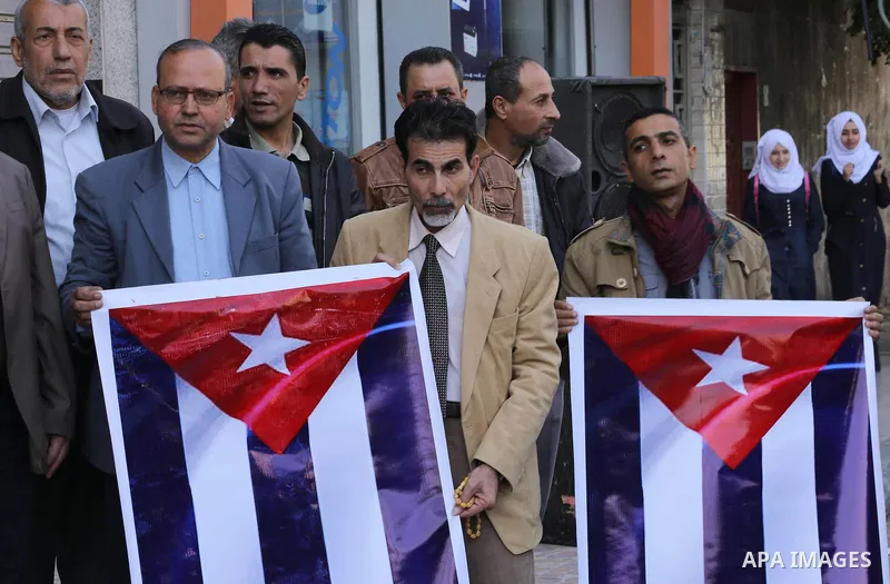 Palestinian supporters of Palestinian People's Party take part in a rally to solidarity with of Cuban historic revolutionary leader Fidel Castro after his death, in Gaza city 27, 2016. Cuban revolutionary icon Fidel Cast...