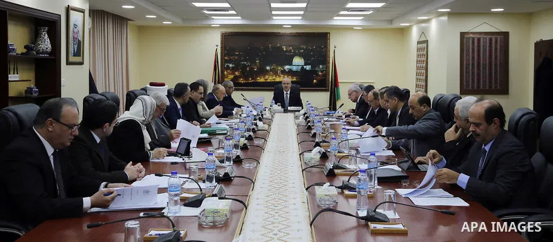 Palestinian Prime Minister, Rami Hamdallah, chairs a meeting of the council Ministers, in the West Bank city of Ramallah, on November 29, 2016. Photo by Prime Minister Office