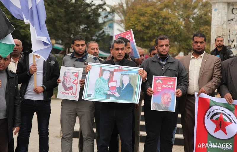 Palestinians hold posters of late Cuban leader Fidel Castro during a gathering in Gaza city on November 29, 2016 to pay tribute him after his death. Cuban revolutionary icon Fidel Castro died late November 25 in Havana,...