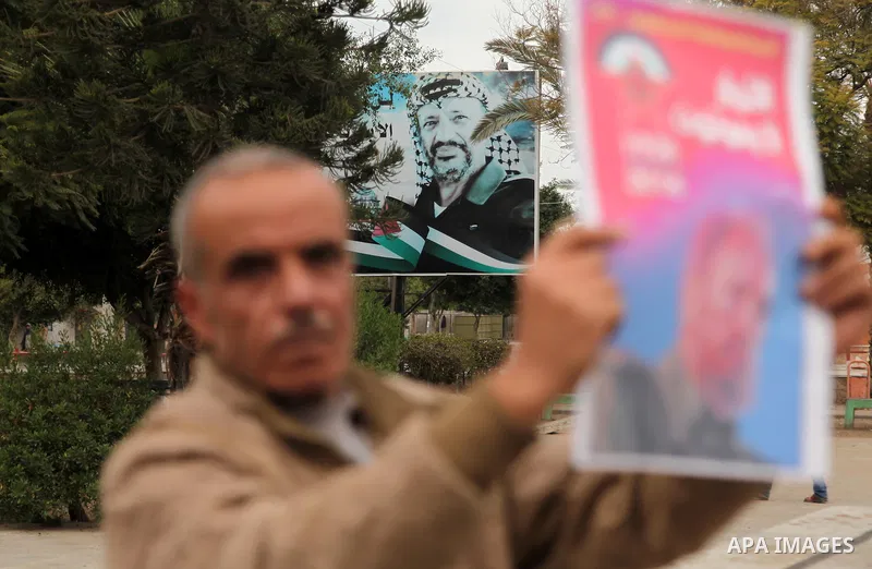 Palestinians hold posters of late Cuban leader Fidel Castro during a gathering in Gaza city on November 29, 2016 to pay tribute him after his death. Cuban revolutionary icon Fidel Castro died late November 25 in Havana,...