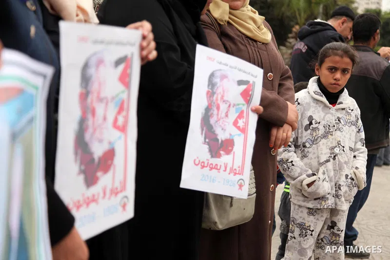 Palestinians hold posters of late Cuban leader Fidel Castro during a gathering in Gaza city on November 29, 2016 to pay tribute him after his death. Cuban revolutionary icon Fidel Castro died late November 25 in Havana,...