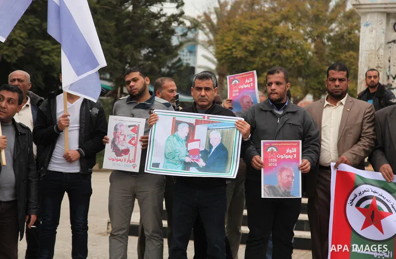 Palestinians hold posters of late Cuban leader Fidel Castro during a gathering in Gaza city on November 29, 2016 to pay tribute him after his death. Cuban revolutionary icon Fidel Castro died late November 25 in Havana,...
