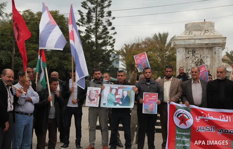 Palestinians hold posters of late Cuban leader Fidel Castro during a gathering in Gaza city on November 29, 2016 to pay tribute him after his death. Cuban revolutionary icon Fidel Castro died late November 25 in Havana,...