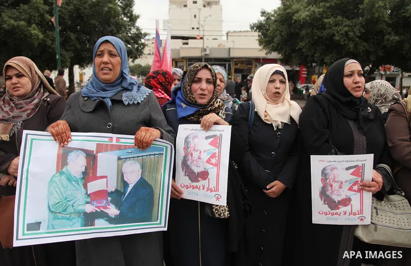 Palestinians hold posters of late Cuban leader Fidel Castro during a gathering in Gaza city on November 29, 2016 to pay tribute him after his death. Cuban revolutionary icon Fidel Castro died late November 25 in Havana,...