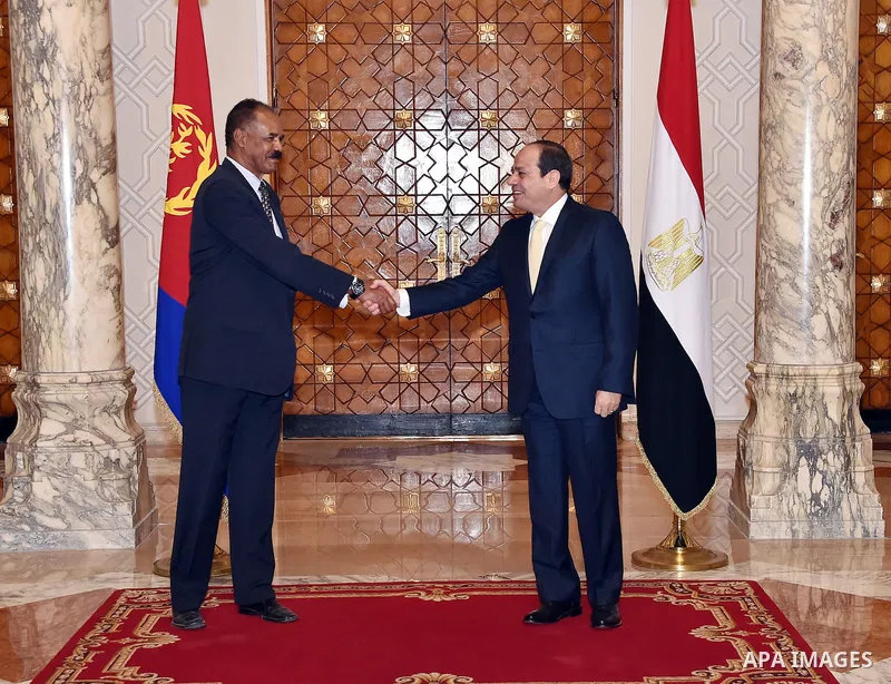 Egyptian President Abdel Fattah al-Sisi shake hands with Isaias Afwerki, President of Eritrea, in Cairo, Egypt, on Nov. 29.2016. Photo by Egyptian President Office