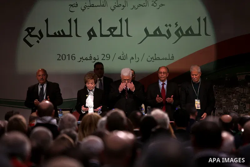 Palestinian president Mahmud Abbas recites the Fatiha or the prayer of the dead, during the opening ceremony of the 7th Fatah Congress on November 29, 2016, at the Muqataa, the Palestinian Authority headquarters, in the...