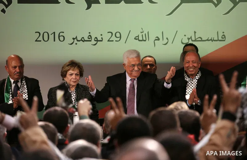 Palestinian president Mahmoud Abbas gestures after delivering a speech on the second day of the 7th Fatah Congress on November 30, 2016, at the Muqataa, the Palestinian Authority headquarters, in the West Bank city of Ra...