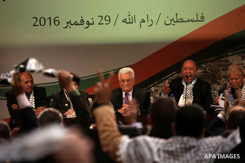 Palestinian president Mahmoud Abbas gestures after delivering a speech on the second day of the 7th Fatah Congress on November 30, 2016, at the Muqataa, the Palestinian Authority headquarters, in the West Bank city of Ra...
