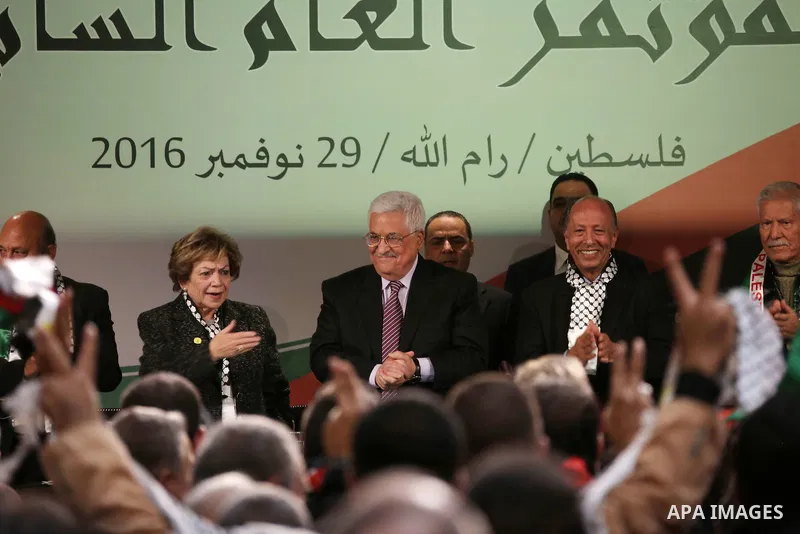 Palestinian president Mahmoud Abbas gestures after delivering a speech on the second day of the 7th Fatah Congress on November 30, 2016, at the Muqataa, the Palestinian Authority headquarters, in the West Bank city of Ra...