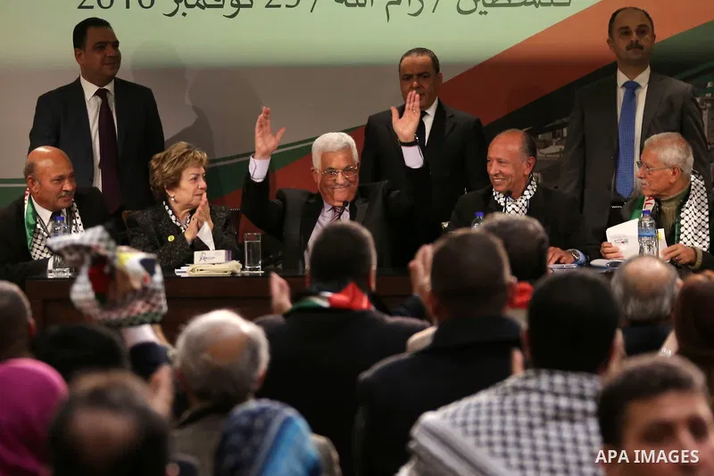 Palestinian president Mahmoud Abbas gestures after delivering a speech on the second day of the 7th Fatah Congress on November 30, 2016, at the Muqataa, the Palestinian Authority headquarters, in the West Bank city of Ra...