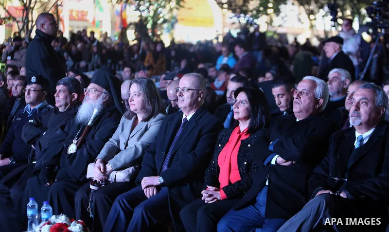 Palestinian Prime Minister, Rami Hamdallah attends the lighting of the Christmas tree on December 3, 2016 at the Manger Square near the Church of the Nativity, revered as the site of Jesus Christ's birth, in the biblical...