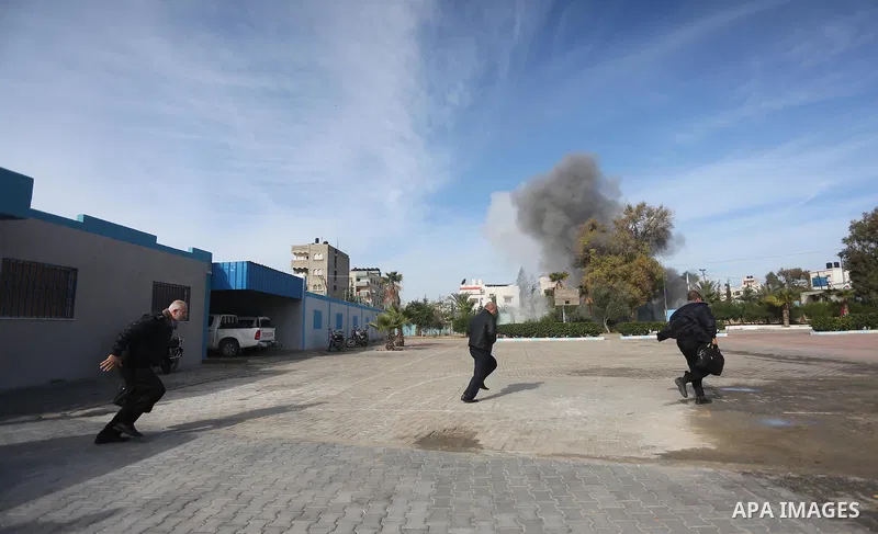 Palestinian Civil Defense members take part in a drill, in Gaza city, on December 4, 2016. Photo by Mohammed Asad