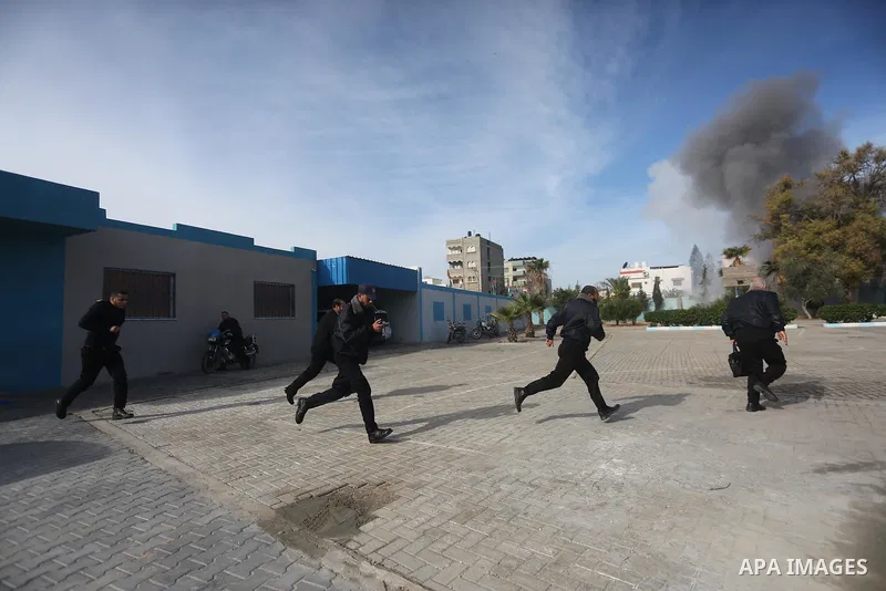 Palestinian Civil Defense members take part in a drill, in Gaza city, on December 4, 2016. Photo by Mohammed Asad