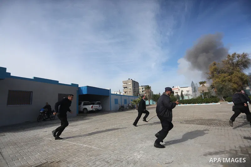 Palestinian Civil Defense members take part in a drill, in Gaza city, on December 4, 2016. Photo by Mohammed Asad