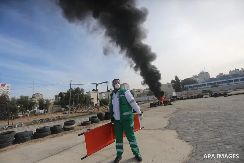 Palestinian Civil Defense members take part in a drill, in Gaza city, on December 4, 2016. Photo by Mohammed Asad