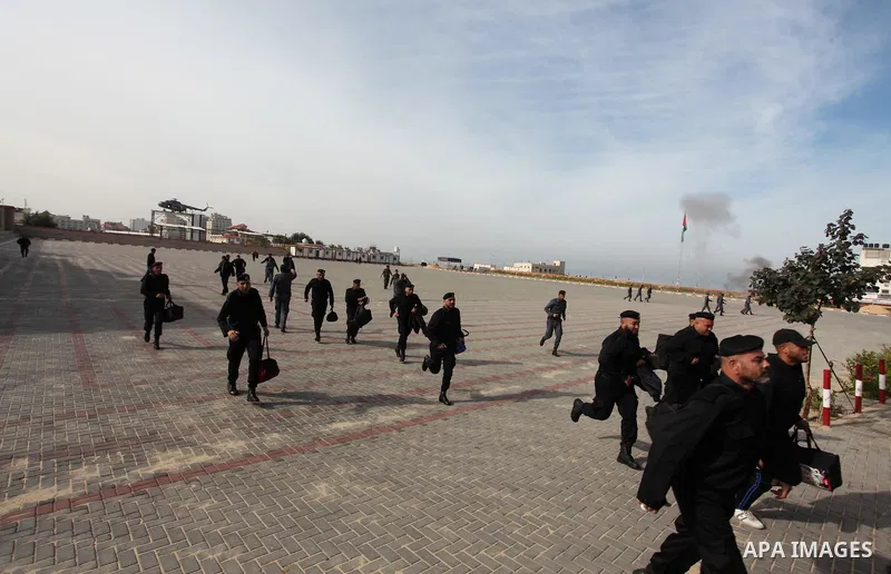 Palestinian policemen take part in a drill, in Gaza city, on December 4, 2016. Photo by Ashraf Amra