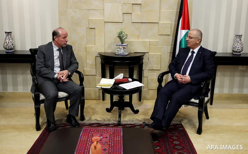 Palestinian Prime Minister Rami Hamdallah meets with director of the United Nations population fund in the Arab countries Loay Shabana, in the West Bank city of Ramallah, on December 4, 2016. Photo by Prime Minister Offi...